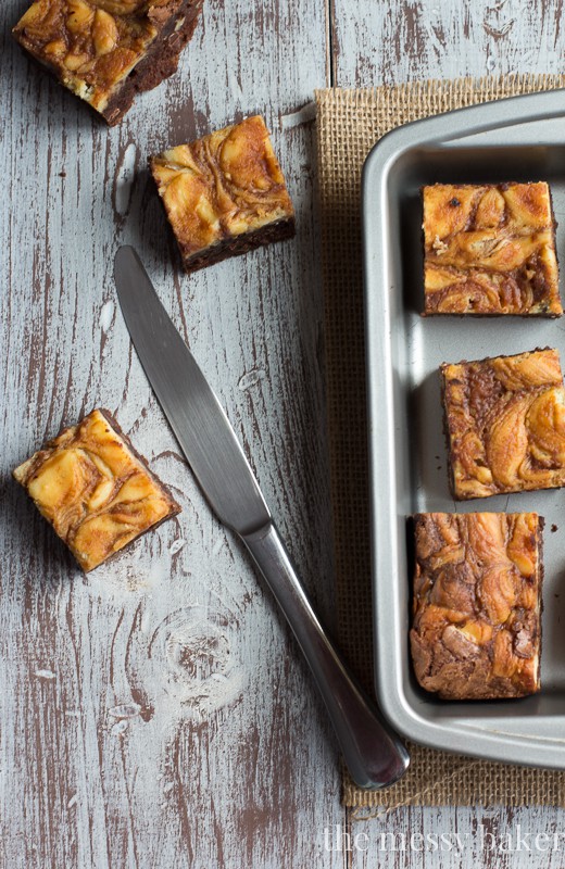 Turtle Cheesecake Swirl Brownies from www.themessybakerblog.com
