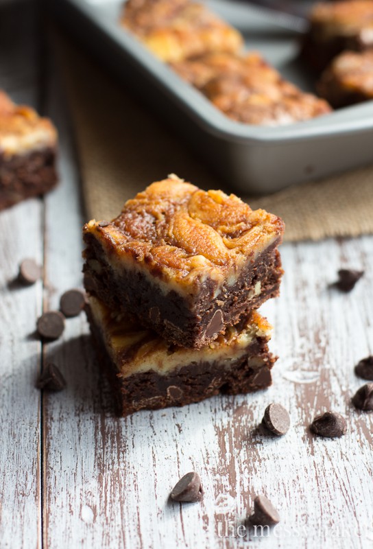 Turtle Cheesecake Swirl Brownies from www.themessybakerblog.com