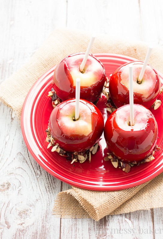 Red Moscato Candied Apples Dipped in Toasted Almonds and Semi-Sweet Chocolate | www.themessybakerblog.com