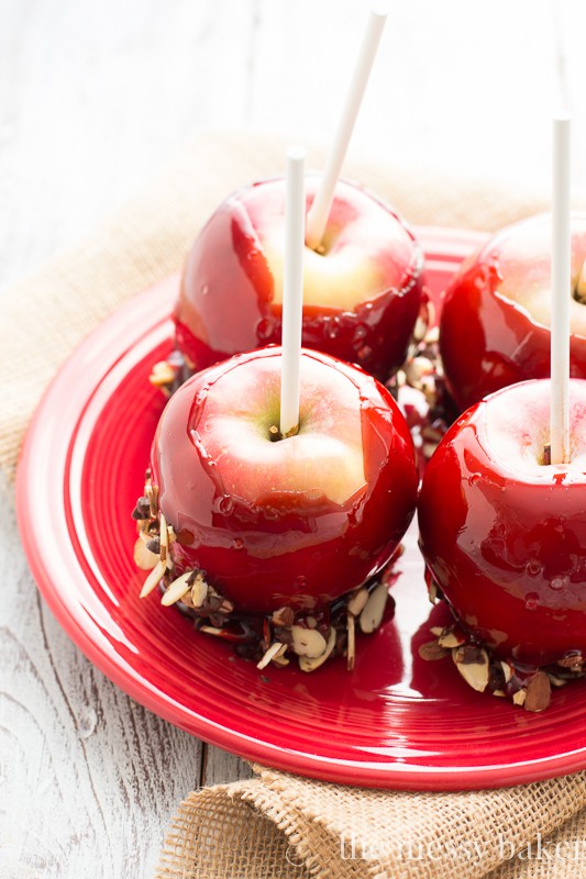 Red Moscato Candied Apples Dipped in Toasted Almonds and Semi-Sweet Chocolate | www.themessybakerblog.com