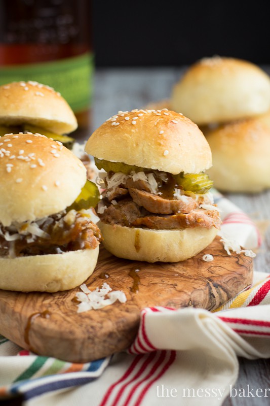 Cuban Pork Sliders with Mustard Bourbon Glaze | www.themessybakerblog.com | These mini sliders are perfect for entertaining, parties, and as a football appetizer. 