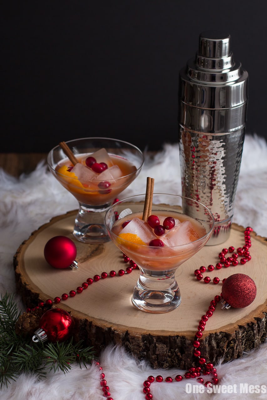 Spiced Cranberry Rum Old-Fashioned: Spiced rum, tart cranberry juice, and warm cinnamon and cloves get shaken to create a festive holiday cocktail perfect for celebrating New Year's Eve.