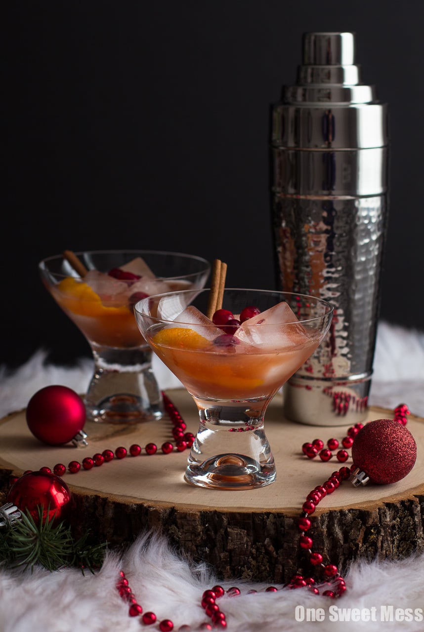 Spiced Cranberry Rum Old-Fashioned: Spiced rum, tart cranberry juice, and warm cinnamon and cloves get shaken to create a festive holiday cocktail perfect for celebrating New Year's Eve.