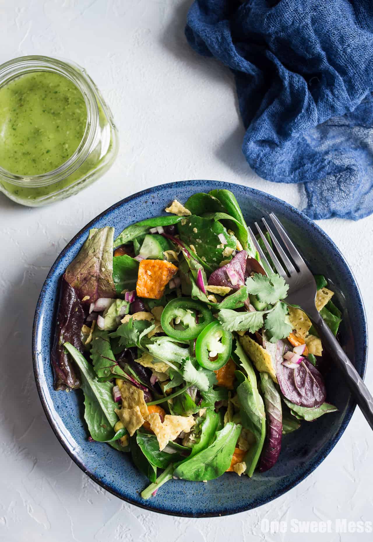 Roasted Sweet Potato and Black Bean Salad with Chili Lime Vinaigrette: This zesty salad with loaded with fresh veggies, creamy avocado, and sweet roasted corn. It's gluten-free, vegan, and super healthy! 