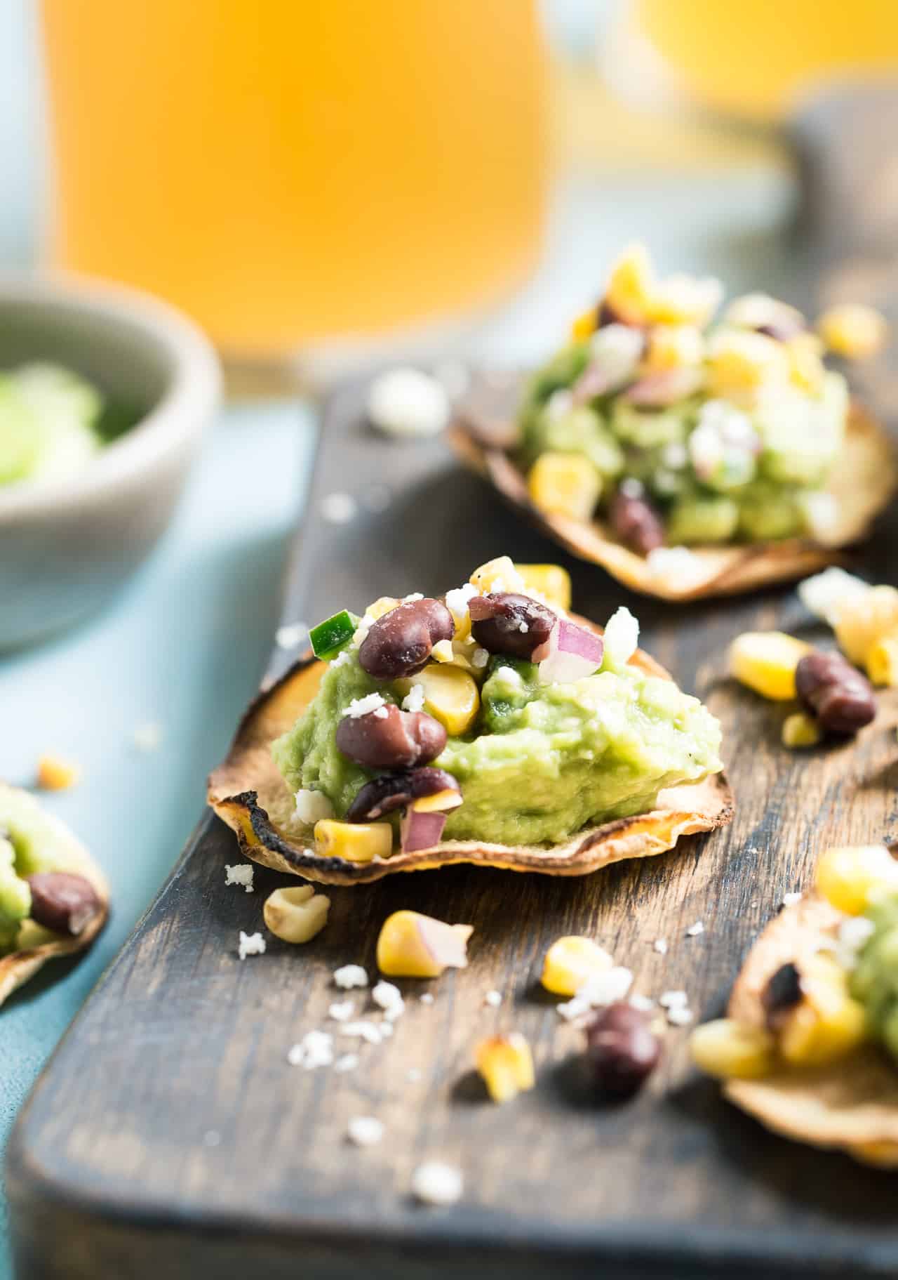 Grilled Corn Salsa & Guacamole Tostadas: This crispy bite-sized appetizer is perfect for football season. They're gluten-free and healthy with a vegan option. 