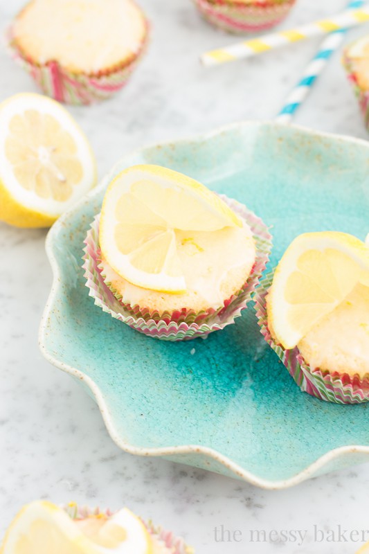 Lemon Cupcakes with Lemon Glaze | www.themessybakerblog.com