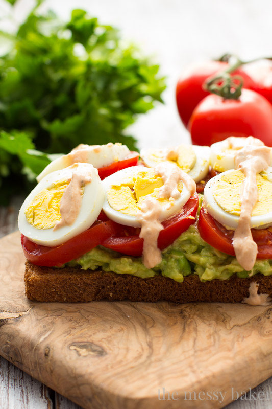 Healthy Avocado, Tomato, and Sliced Egg Toast. This open-faced sandwich is perfect for breakfast or lunch.