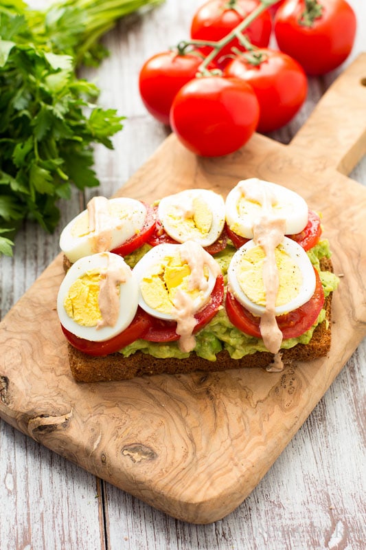 Healthy Avocado, Tomato, and Sliced Egg Toast. This open-faced sandwich is perfect for breakfast or lunch.